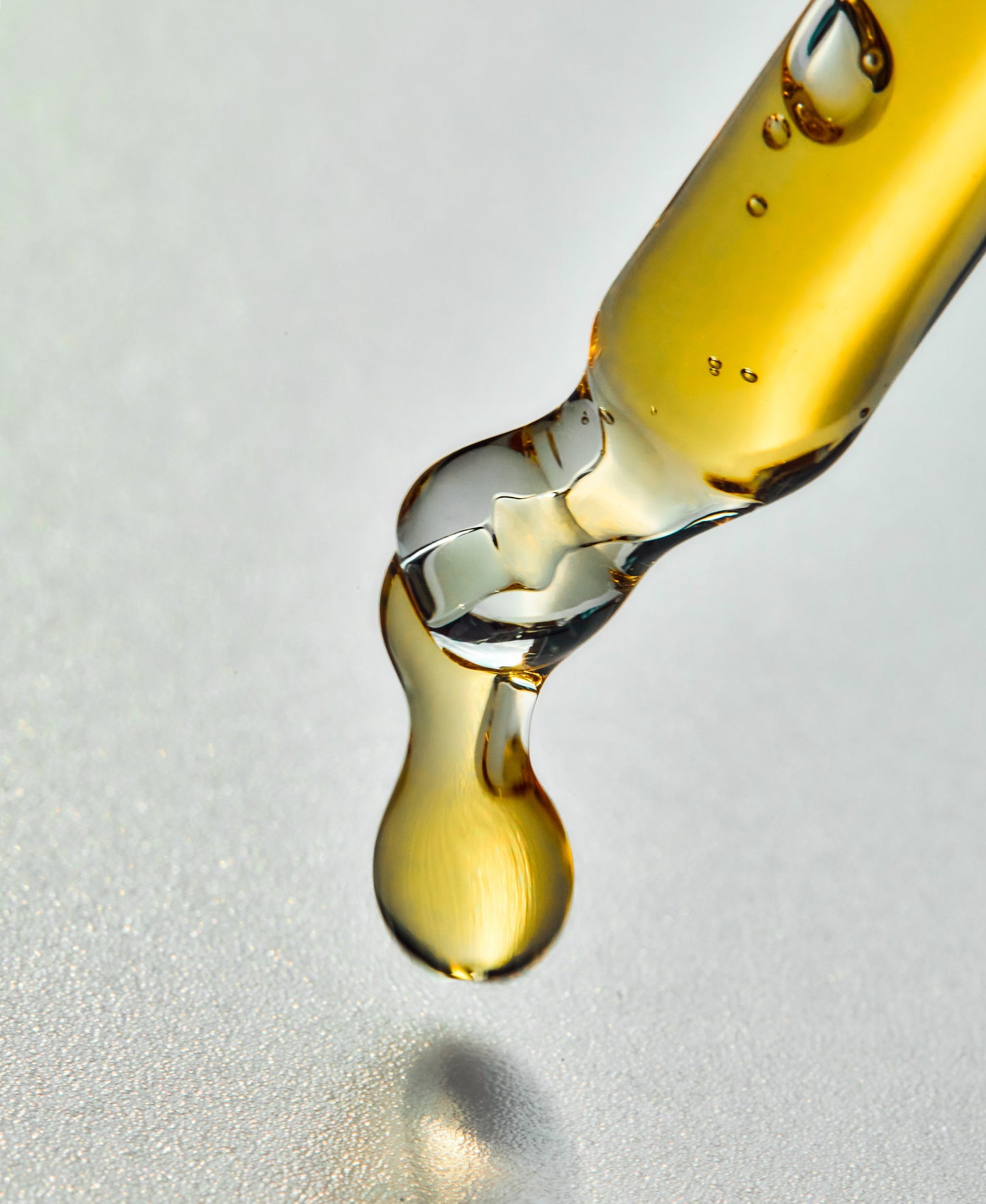 The Overnight Renewal Serum drop close up.