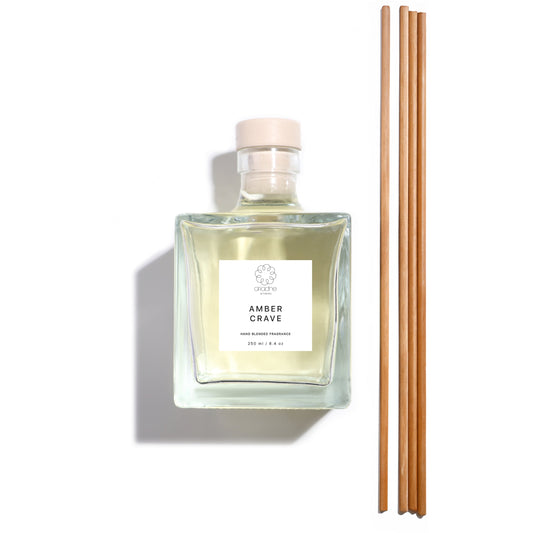 The Amber Crave Diffuser with its sticks front side