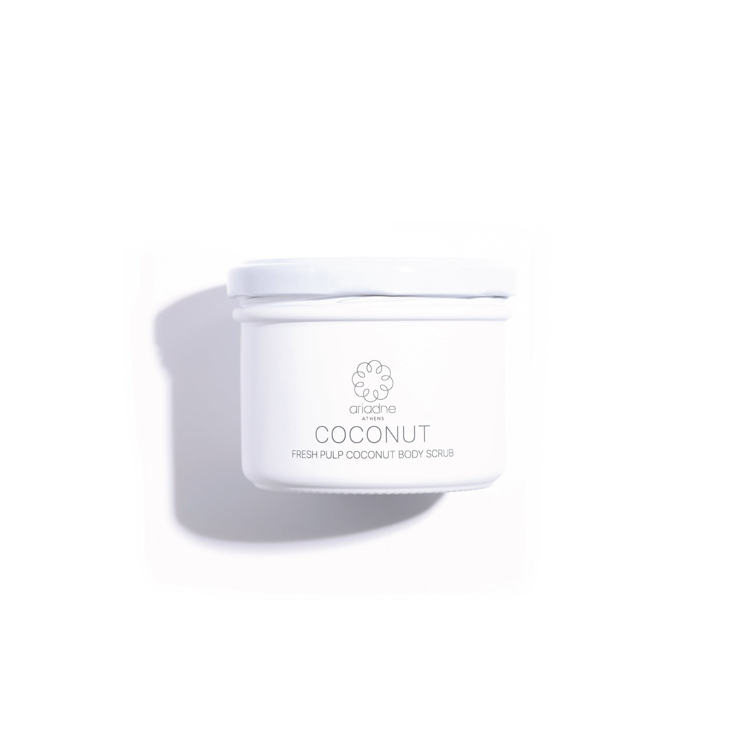 A jar of the Coconut Fresh Pulp Body Scrub front side.